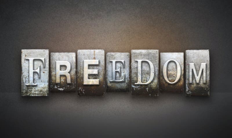 The word FREEDOM written in vintage letterpress type. The word FREEDOM written in vintage letterpress type