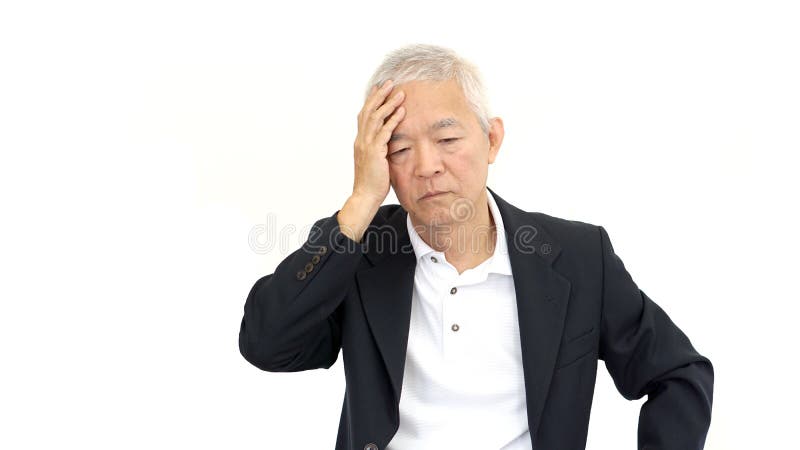 Preocupação e esforço superiores asiáticos do homem de negócios imagem de stock Preocupação e esforço superiores asiáticos do homem de negócios imagem de stock