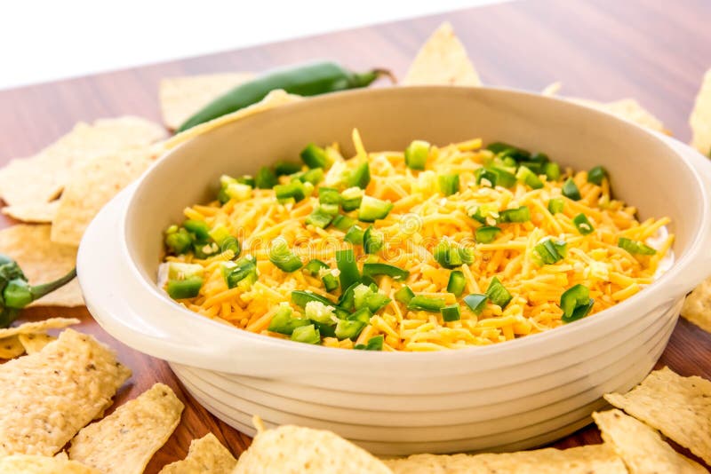 Preparation of Bean Dip with Jalapenos, Sour Cream and Cheddar C Stock