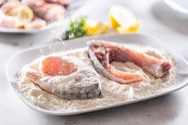 Preparation of Fresh Fish before Frying by Wrapping in Flour Stock