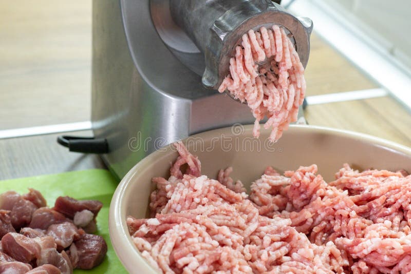 Preparation Of Minced Meat From Fresh Pork Through A Grinder In The Preparation Of Minced Meat From Fresh Pork Through A Grinder In The
