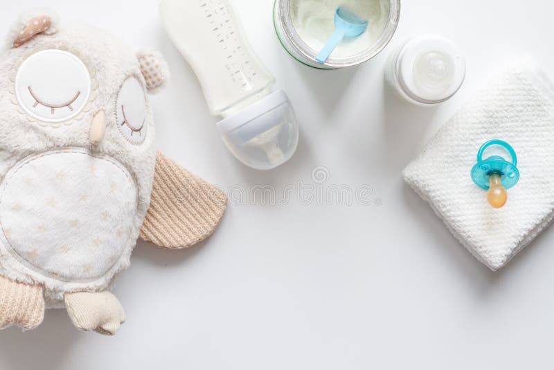 Preparation of mixture baby feeding on white background top view