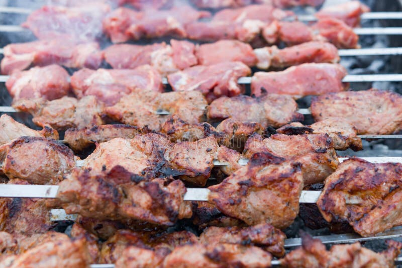 Preparation of Raw Barbecue, Frying Pork on Skewers. Stock Image ...