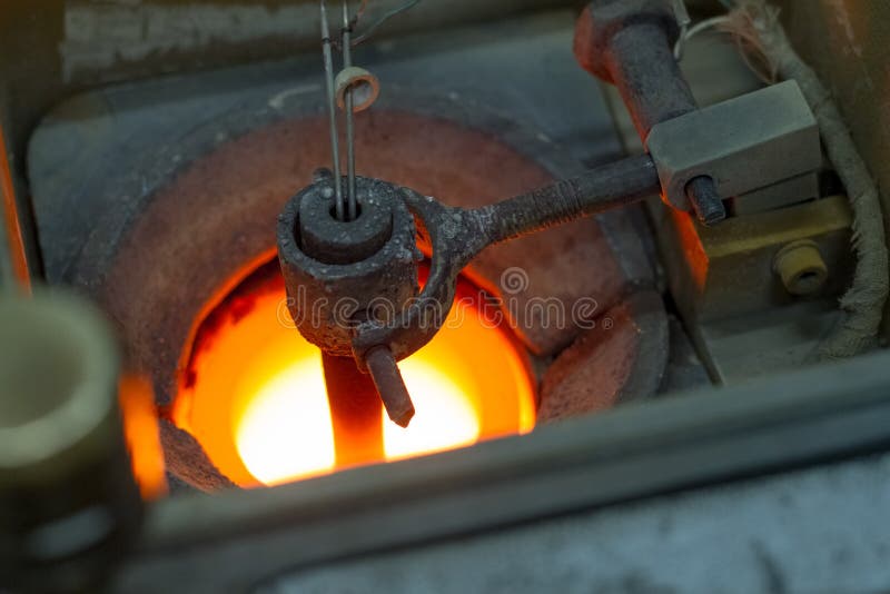 Preparation for smelting silver jewelry in a workshop for the manual production of jewelry stock photos Preparation for smelting silver jewelry in a workshop for the manual production of jewelry stock photos