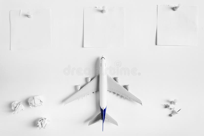 Preparation for Traveling concept and to do list, blank paper noted, paper ball, airplane, push pin. royalty free stock photos
