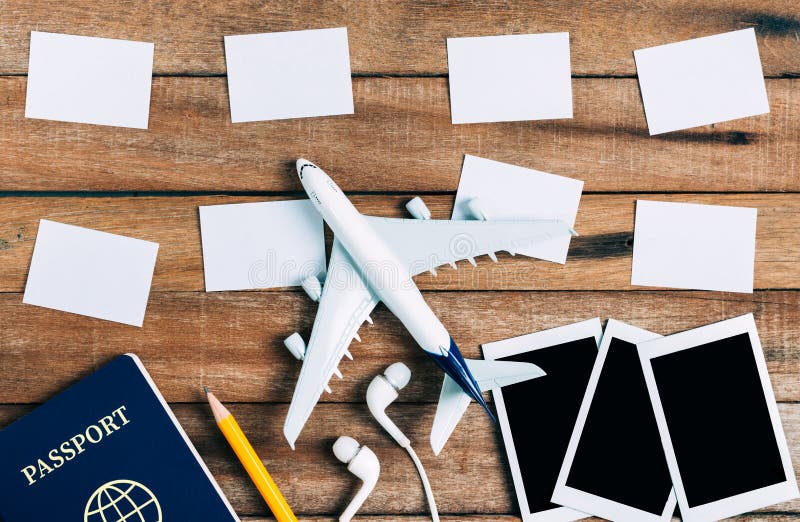 Preparation for Traveling concept and to do list, paper noted, airplane, photo frame, ear phone, pencil, passport. stock image