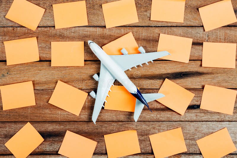 Preparation for Traveling concept and to do list, the paper noted, airplane. stock photo