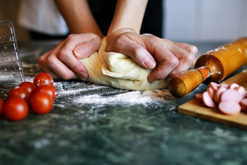 Prepare pizza dough hand stock photo. Image of horizontal 79343458