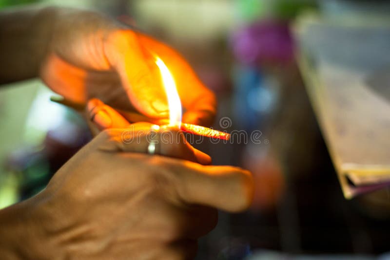 Unidentified master prepare tools for traditional tattoo bamboo, Dec 24, 2012 in Koh Chang. Thai tattooists are very popular among tourists prices range from 500 baht and up