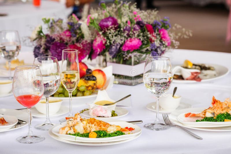 Prepared lobster and sea weed served on plates. Prepared lobster and sea weed served on plates.