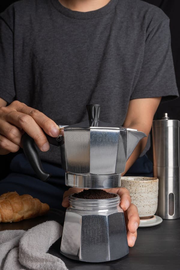 A Barista Using The Flair Espresso Maker Is A Non-electric Coffee Brewing  Device Using A Lever Or Handle. For Extracting Espresso On A Table With  Coffee Making Iced Coffee. Soft Focus Stock