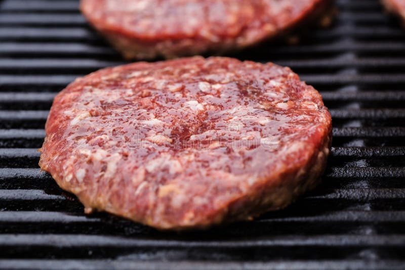 Preparing a Batch of Grilled Ground Beef Patties Stock Photo Image of