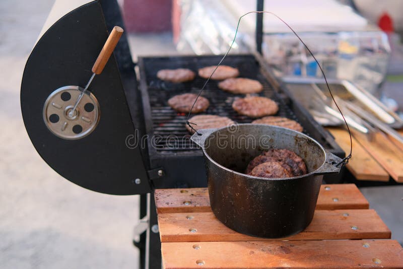 Preparing a Batch of Ground Beef Patties or Frikadeller on Grill or BBQ