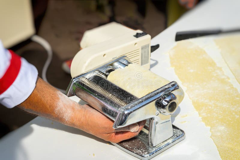 Preparing Fresh Homemade Pasta, Noodles with Traditional Rolled Pasta