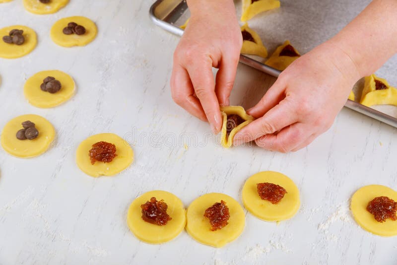 Preparing hamantaschen cookies for Purim. Jewish holiday concept royalty free stock photos Preparing hamantaschen cookies for Purim. Jewish holiday concept royalty free stock photos