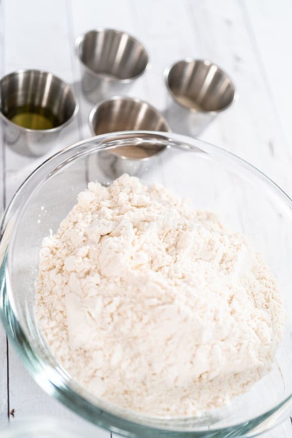 Making pizza dough stock image. Image of dough, making 271274219