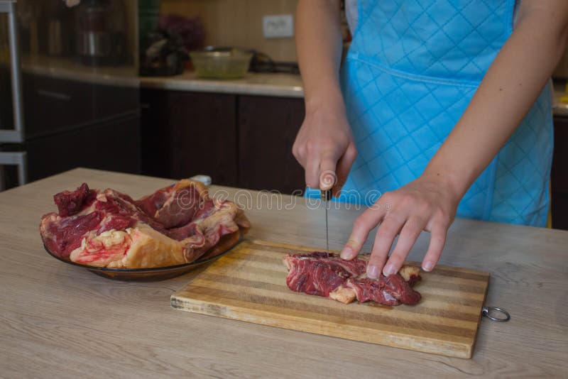 Preparing Lean Meat. Hands of a Man Preparing Meat and Vegetables in a