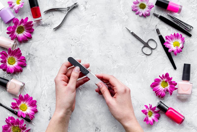 Preparing for Manicure. Woman Hand with Manicure Tool on Grey Background  Top View Copyspace Stock Photo - Image of fashion, gloss: 99771916