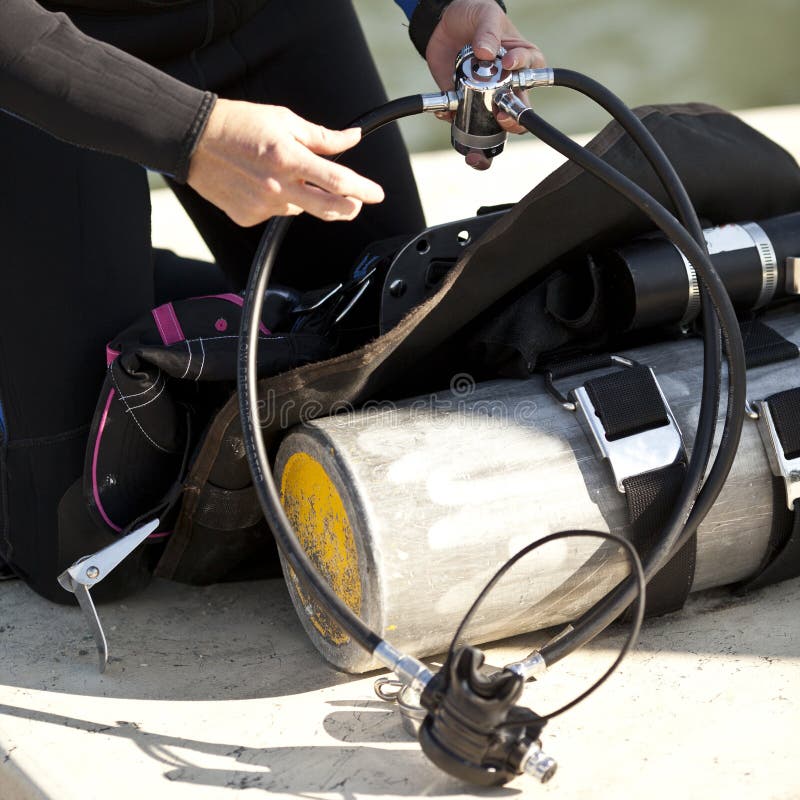 Preparing Scuba Gear for Use Stock Photo Image of bouyancy, buckle