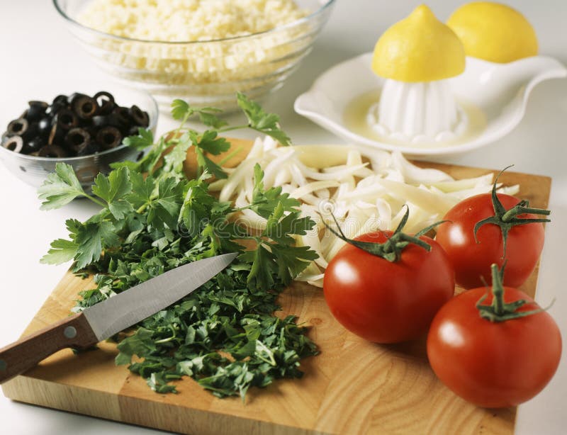 Preparing the tabbouleh stock image Preparing the tabbouleh stock image