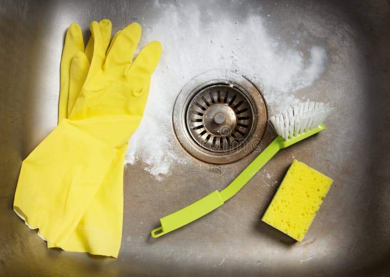 Preparing to clean the sink