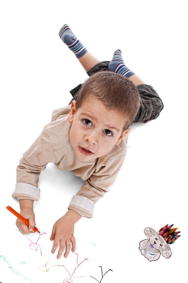 Preschool aged boy drawing