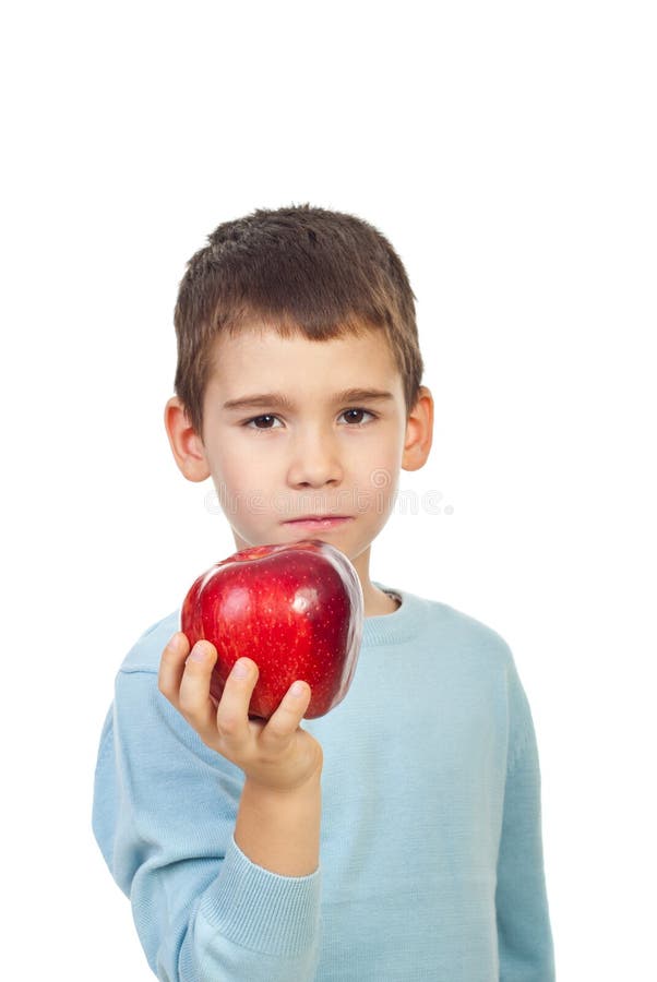 Preschool boy holding red apple