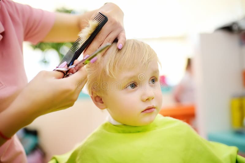 Preschooler boy getting haircut