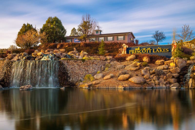 Prescott Lakes sign with an artificial waterfall in Arizona