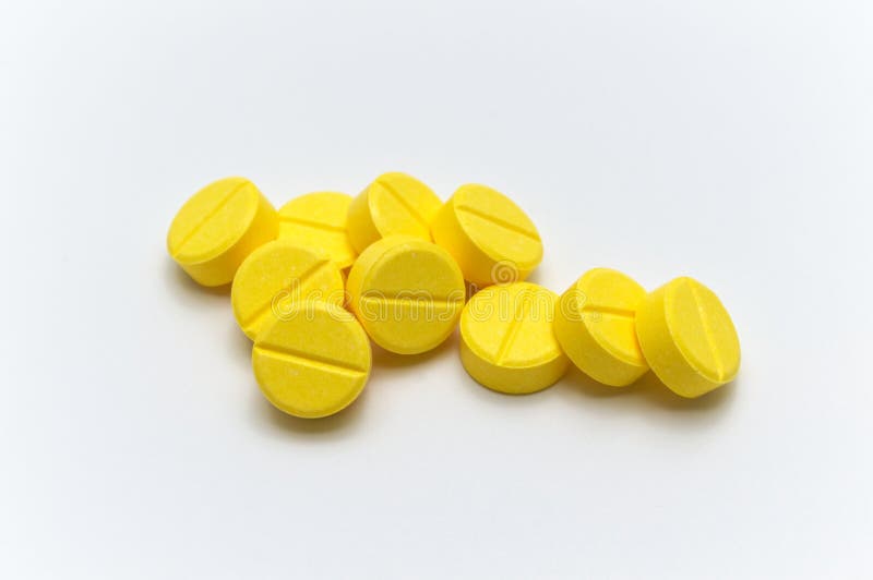 Prescription drugs,medicine of tablets or pills with yellow color. 