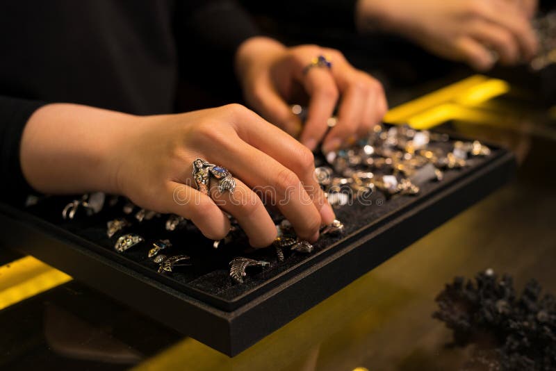 Presentation of Retail Showcase in Jewellery Store with Rings Stock