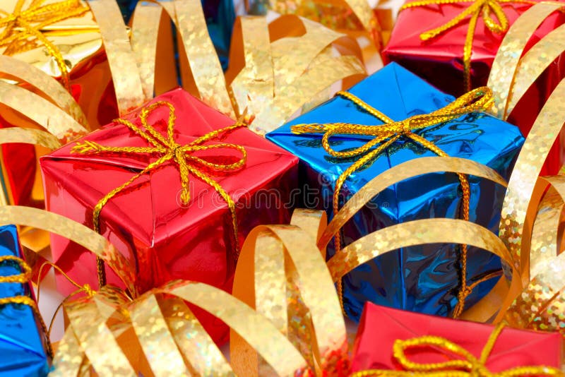 Multicolored gifts and ribbon, abstract holiday background. Multicolored gifts and ribbon, abstract holiday background