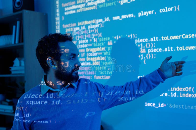 Presenting Data Analysis on Digital Screen in Dark Room royalty free stock photo