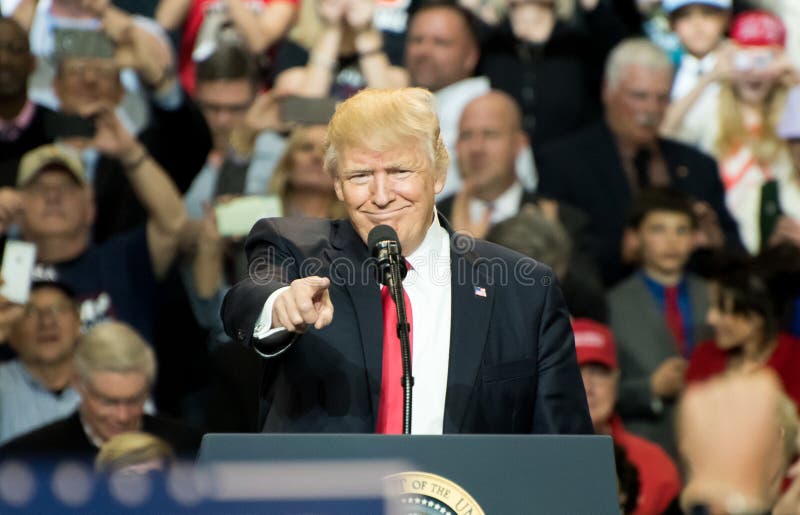 Louisville, Kentucky â€“ March 20, 2017: President Donald J. Trump addresses a crowd at a rally inside Freedom Hall in Louisville, Kentucky, on March 20, 2017. Louisville, Kentucky â€“ March 20, 2017: President Donald J. Trump addresses a crowd at a rally inside Freedom Hall in Louisville, Kentucky, on March 20, 2017.