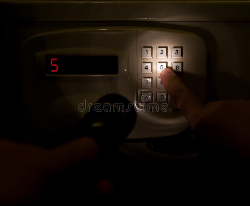 Pressing a safebox royalty free stock images