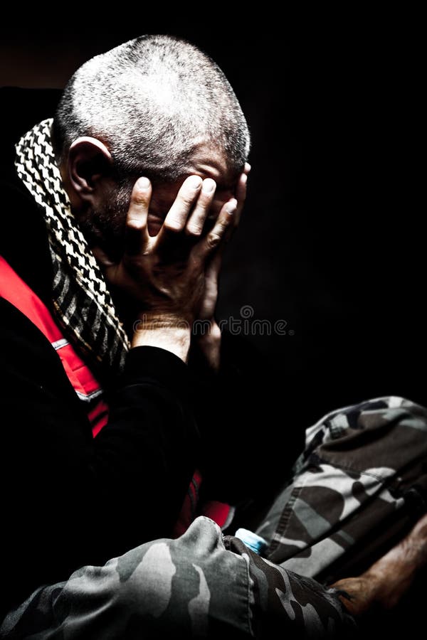 Man in pain, portrait, studio shot. Man in pain, portrait, studio shot