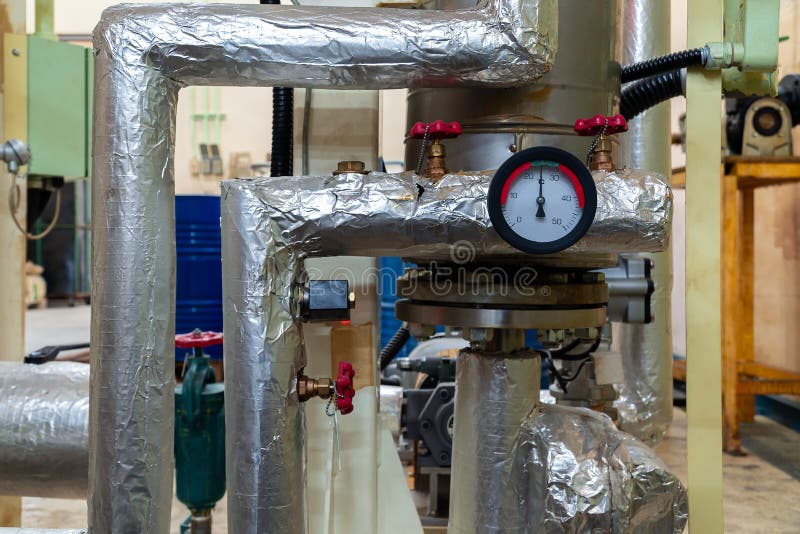 Pressure Gauge Dial Install To Pipe Wrapped with Insulation. Stock