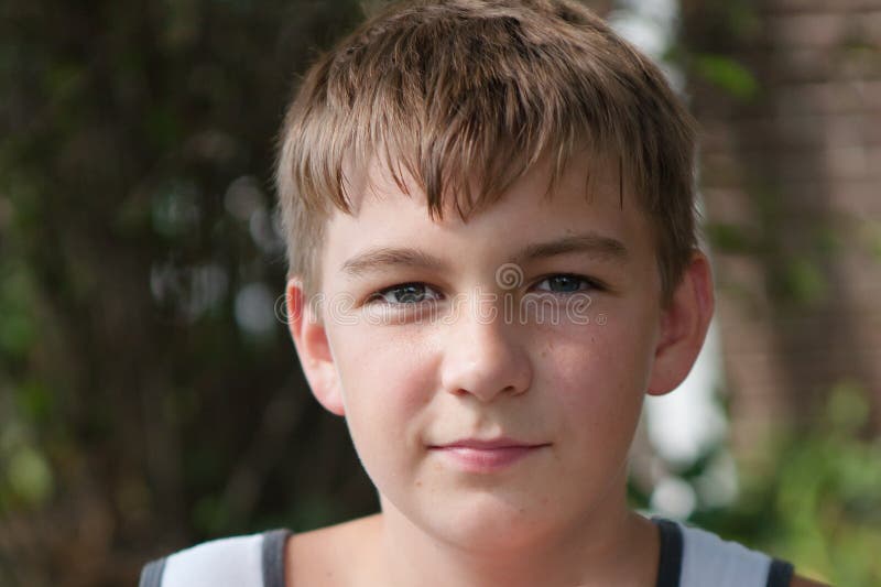 14 year old boy with brown hair and blue eyes