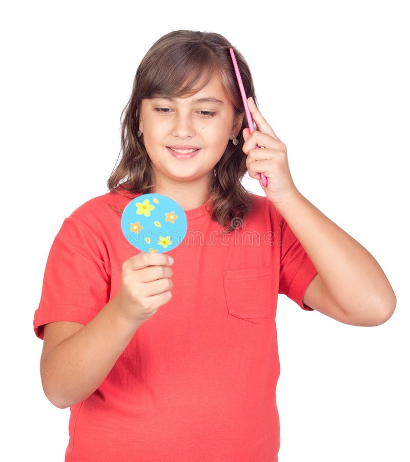 Preteen girl combing with a comb