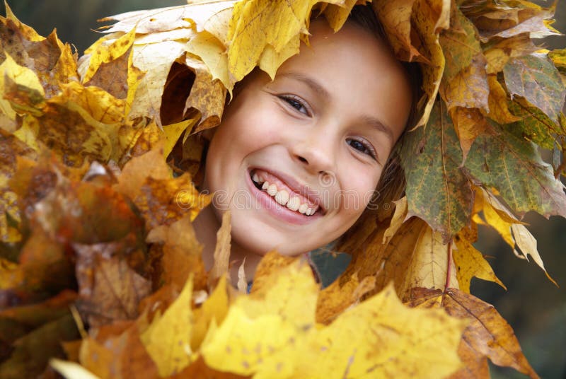 Preteen girl in leaf garland