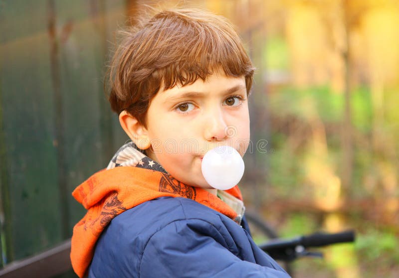 Preteen Handsome Boy with Chewing Gum Bubble Stock Image - Image of ...