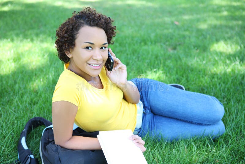 Pretty African American On Cell Phone stock photo Pretty African American On Cell Phone stock photo