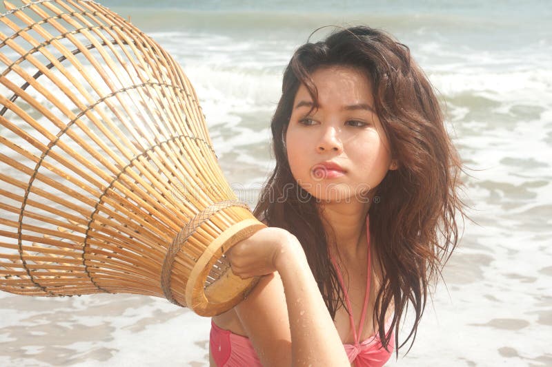 Pretty Asian Woman Posing on Beach. Stock Photo Image of ocean, happy