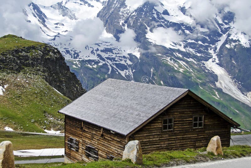 Pretty Austrian House with Magnificent View of the Alps Stock Photo