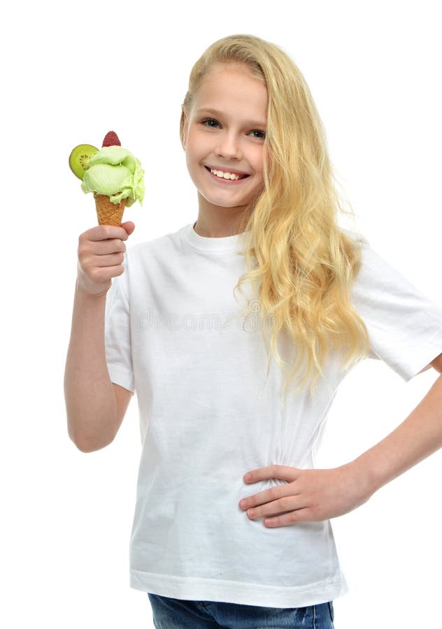 Pretty baby girl kid holding ice cream in waffles cone with strawberry showing happy smiling