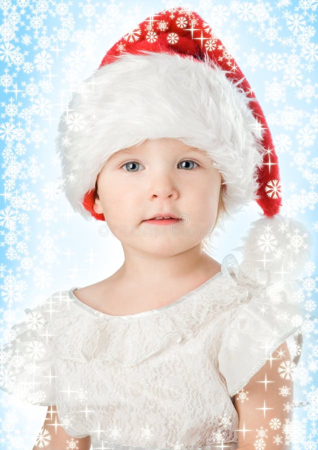 Pretty baby in santa claus christmas red hat