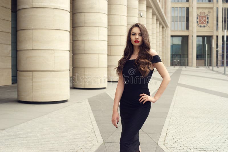Pretty beautiful business woman in elegant black dress royalty free stock images Pretty beautiful business woman in elegant black dress royalty free stock images