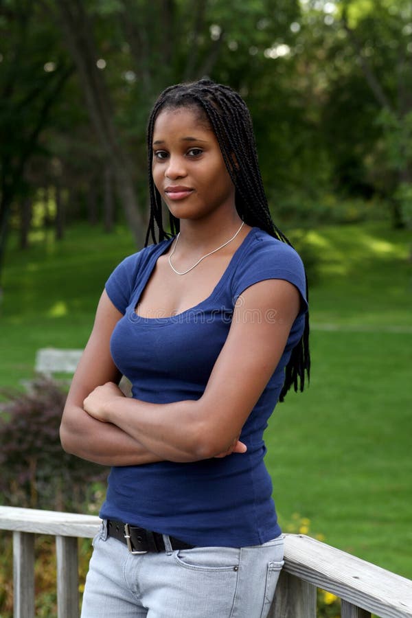 Pretty black teenage girl in the park