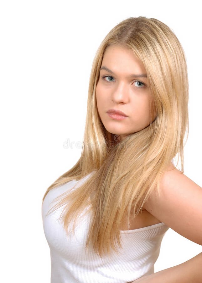 Pretty blond girl posing on white background.