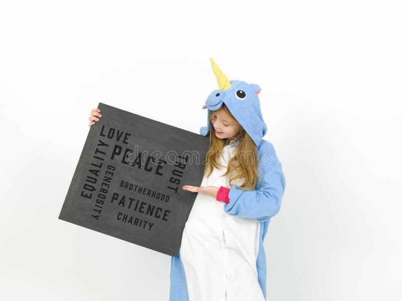 Pretty blonde girl with cozy blue unicorn costume with blackboard with diff...